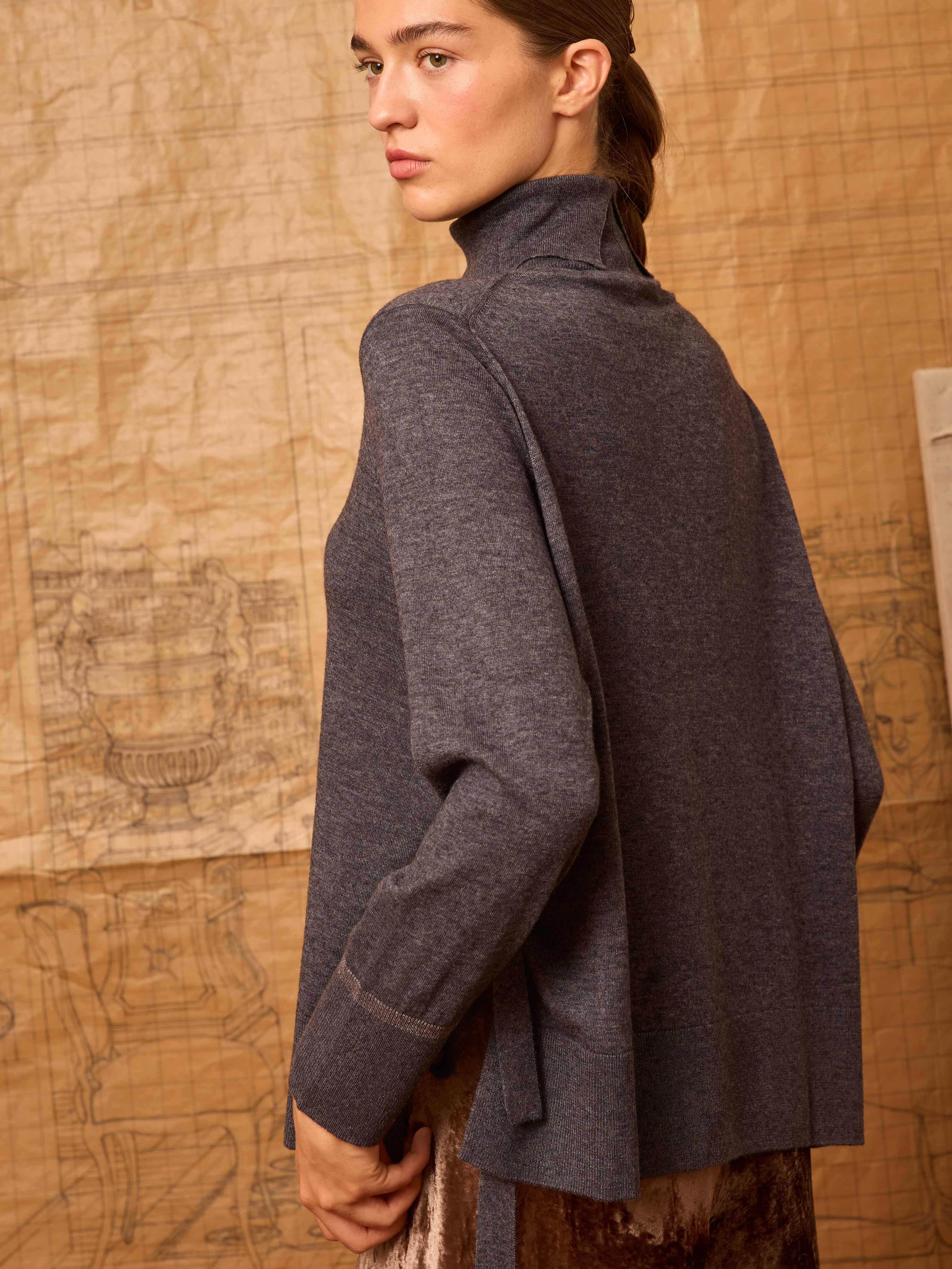 Jersey gris con lazadas laterales