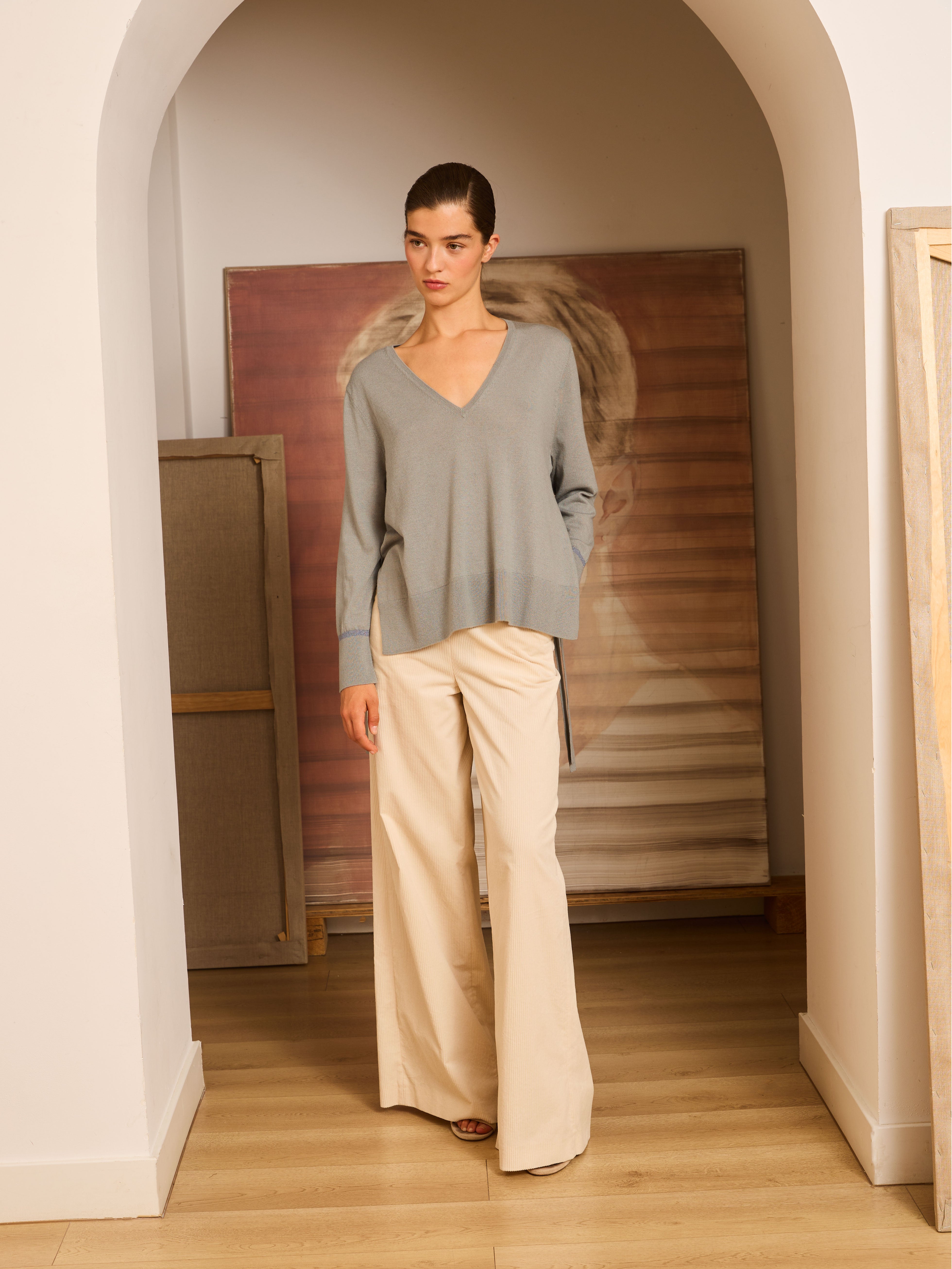 Jersey aguamarina de pico con lazadas